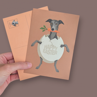 Postkarte A6 mit Windhund, der in einem Osterei steckt.